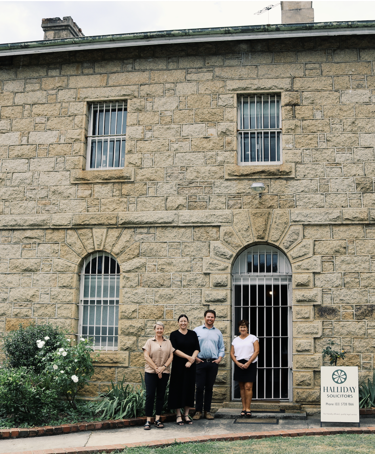Some of the Halliday Solicitors team stand out the front of the Old Beechworth Gaol. 